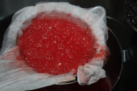 Drain watermelon through sieve lined with muslin cloth